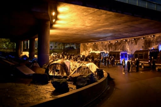 Officials said 1,600 migrants were removed from the makeshift camps set up under the ring road that surrounds Paris