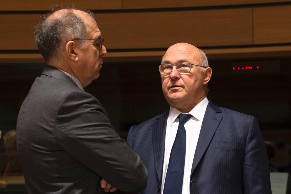 France's Ambassador to the European Union, Pierre Sellal (L) talks with French Finance minister Michel Sapin during an Ecofin EU finance ministers meeting in Luxembourg on October 11, 2016.  / AFP / JOHN THYS        (Photo credit should read JOHN THYS/AFP/Getty Images)