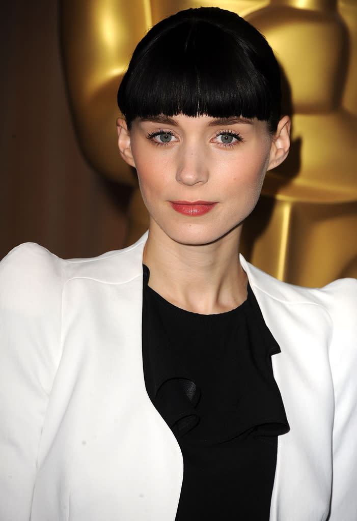 Celebrity name: Rooney Mara<br><br> Birth name: Patricia "Tricia" Rooney Mara <br><br>The star of "The Girl With the Dragon Tattoo" is a girl with a different name. Mara, who has been nominated for an Oscar in the best actress category for her memorable performance, started out life as Patricia, but goes by her two family names: Rooney Mara. The 26-year-old's last name was known before she became famous: Her grandfather, Wellington Mara and her uncle, John Mara, were longtime owners of the New York Giants.