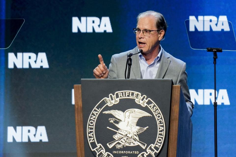 U.S. Sen. Mike Braun speaks Friday, April 14, 2023, during the NRA convention at the Indiana Convention Center in Indianapolis.