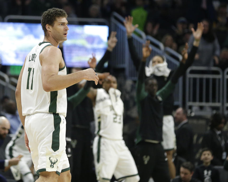 Milwaukee Bucks’ Brook Lopez reacts after making a three-point basket during the second half of an NBA basketball game against the Los Angeles Clippers, Thursday, March 28, 2019, in Milwaukee. (AP Photo/Aaron Gash)