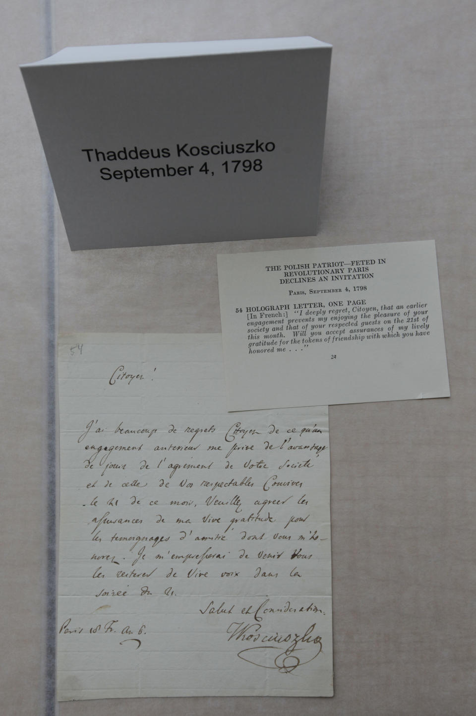 This photo taken Wednesday, June 20, 2012, at FBI Headquarters in Chicago, shows a letter written by American Revolution hero Thaddeus Kosciuszko in September of 1798, just one of the more than 120 stolen artifacts missing for decades from the Chicago Polish Museum of America _ including letters with the signatures of Abraham Lincoln, Thomas Jefferson and Kosciuszko that were returned to the Museum by the FBI on Wednesday. The items include letters and documents dating to the 18th and 19th centuries, seals, military medals and Nazi propaganda from World War II. The pieces, which the FBI valued at about $5 million, also included documentation about Napoleon, George Washington, John Adams and Polish kings. (AP Photo/M. Spencer Green)