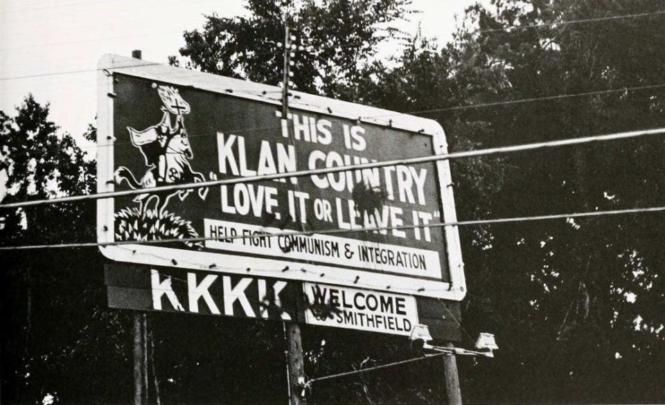 A billboard, which stood along U.S. 70 in Johnston County. The billboard said, “This is Klan Country. Love It or Leave It. Help Fight Communism & Integration. KKK Welcome to Smithfield.”