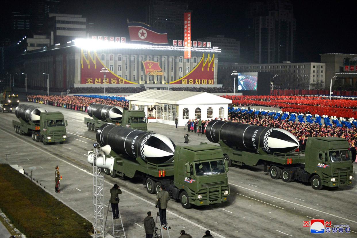 <p>This photo provided by the North Korean government shows missiles during a military parade in Pyongyang, North Korea on 14 January. </p> (Korean Central News Agency/Korea News Service via AP)