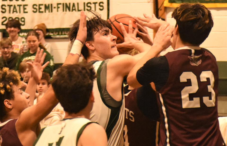 Hamilton Emerald Knight Luke Jackson goes up for a shot against Frankfort-Schuyler's Maroon Knights Friday, Feb. 23, 2024, in Hamilton, New York,