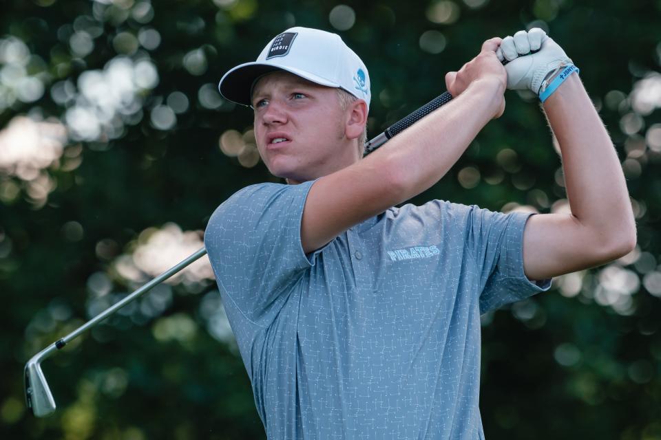 Garaway's Carter Miller follows through on his third drive during the Pirate Invitational Golf Tournament, Friday, Aug. 5 at Black Gold Golf Course in Sugarcreek.