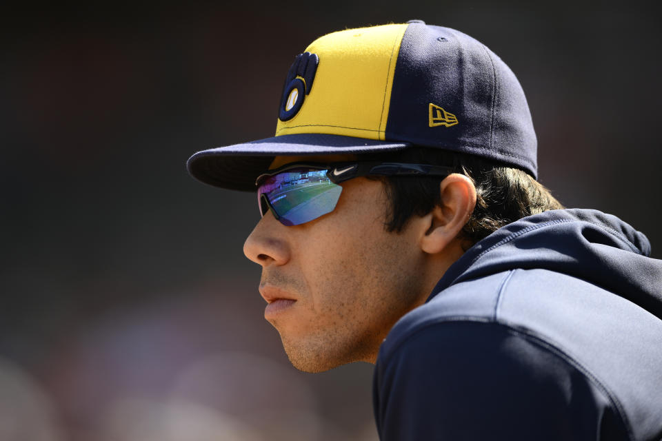 Milwaukee Brewers' Christian Yelich looks on from the dugout during the fifth inning of a baseball game against the Baltimore Orioles, Sunday, April 14, 2024, in Baltimore. (AP Photo/Nick Wass)
