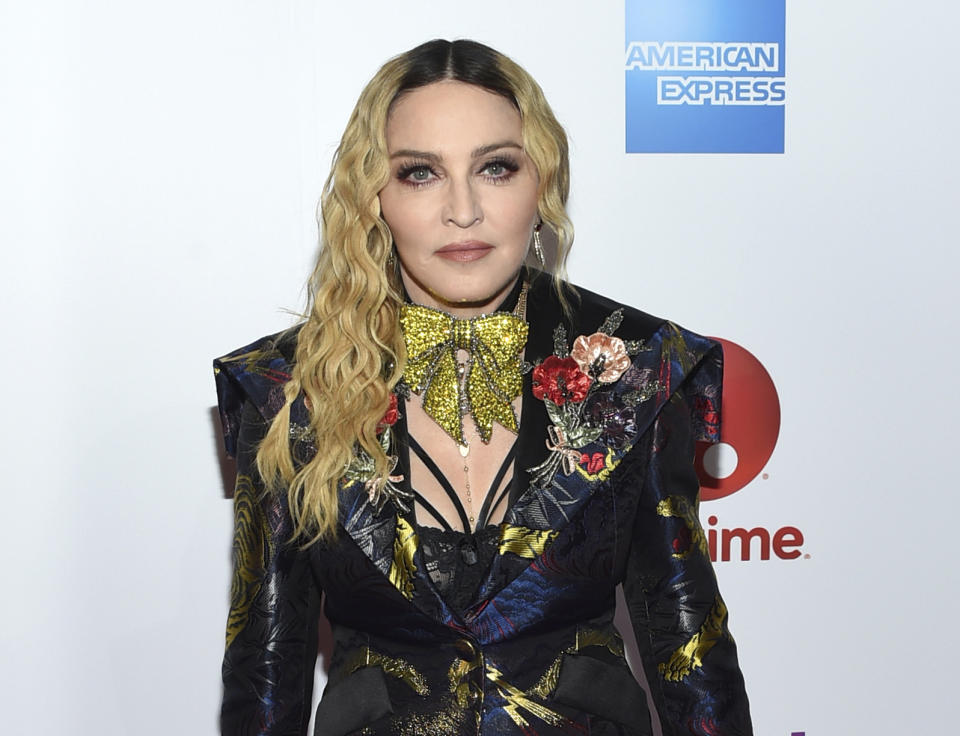 FILE - This Dec. 9, 2016 file photo shows Madonna at the 11th annual Billboard Women in Music honors in New York. On Monday, the Hollywood Reporter announced that Universal had acquired the rights to “Blond Ambition,” a script about the singer. On Tuesday, Madonna expressed her displeasure via an Instagram post. She said that only she was qualified to tell her story and “anyone else who tries is a charlatan and a fool.” (Photo by Evan Agostini/Invision/AP, File)