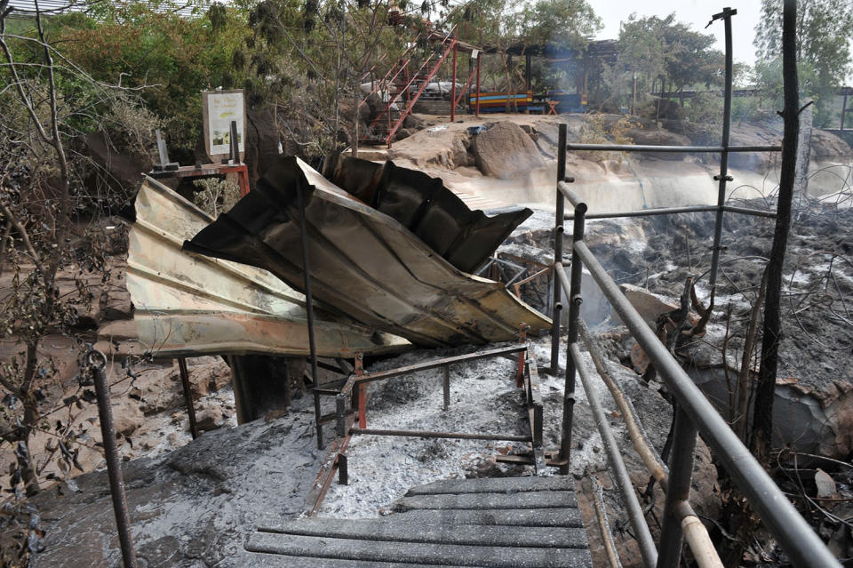 <p>Photo taken June 19, 2017 shows burned barracks inside the Kangaba tourist resort in Bamako on June 20, 2017, a day after suspected jihadists stormed the resort, briefly seizing more than 30 hostages and leaving at least two people dead. (Habibou Kouyate/AFP/Getty Images) </p>