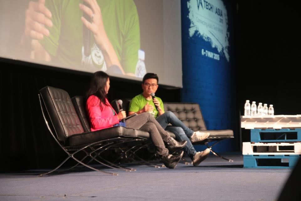 Zopim's CEO Royston Tay on stage at Tech in Asia Singapore 2015