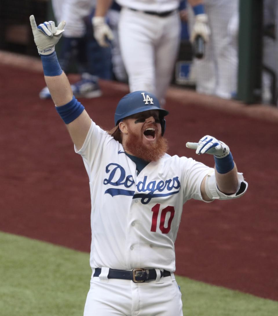 Dodgers third baseman Justin Turner celebrates after hitting a home run in the first inning.