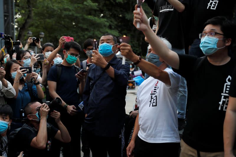 Apple Daily founder Lai attends a candlelight vigil in Hong Kong to mark the 31st anniversary of the crackdown of pro-democracy protests at Beijing's Tiananmen Square in 1989