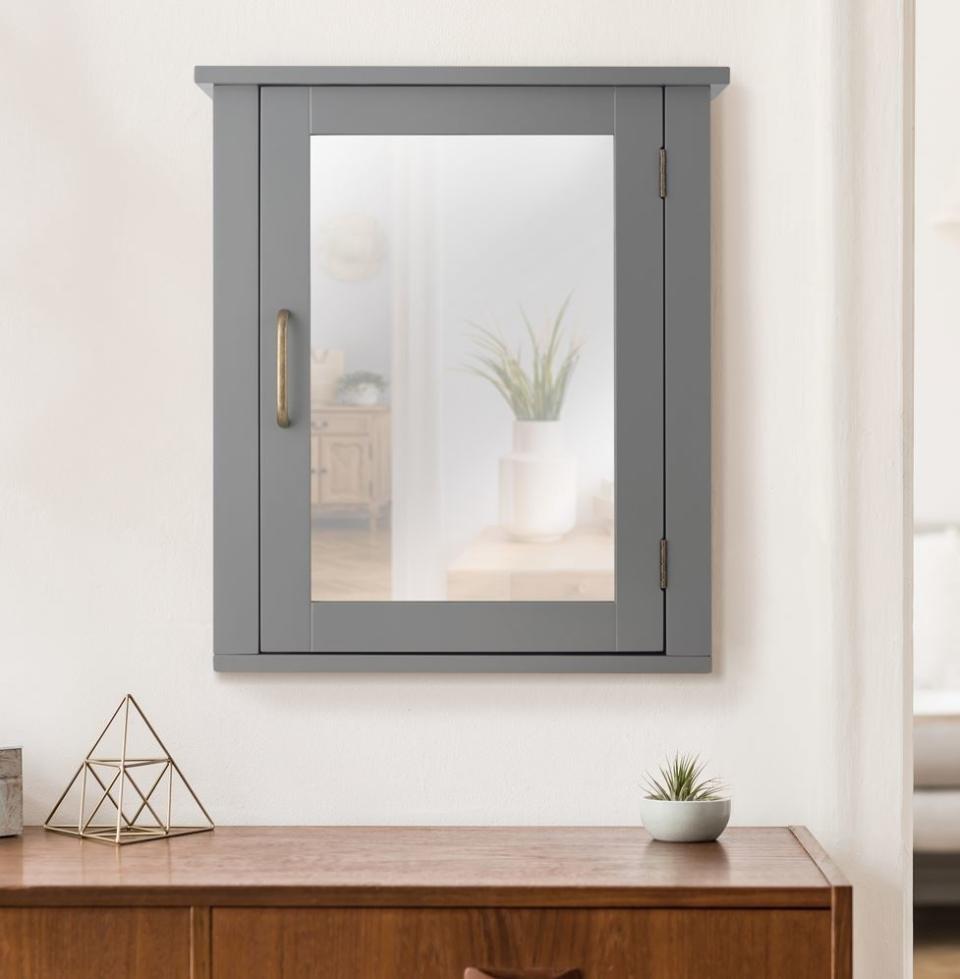 dark grey medicine cabinet with mirror