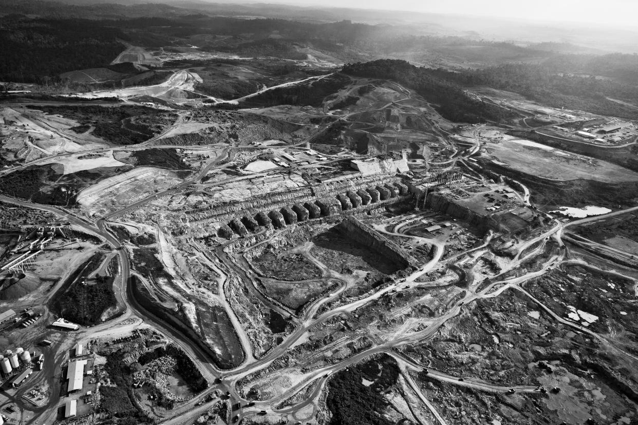 This image provided by World Press Photo, part of a series titled Amazonian Dystopia, by Lalo de Almeida for Folha de Sao Paulo/Panos Pictures which won the World Press Photo Long-Term Project award,, shows An aerial view of the construction of the Belo Monte Dam on the Xingu River, Altamira, Para, Brazil, Sept. 3, 2013. More than 80% of the river's water has been diverted from its natural course to build the hydroelectric project. The drastic reduction in water flow has an adverse impact both on the environment and on the livelihoods of traditional communities living downstream of the dam. (Lalo de Almeida for Folha de Sao Paulo/Panos Pictures/World Press Photo via AP)