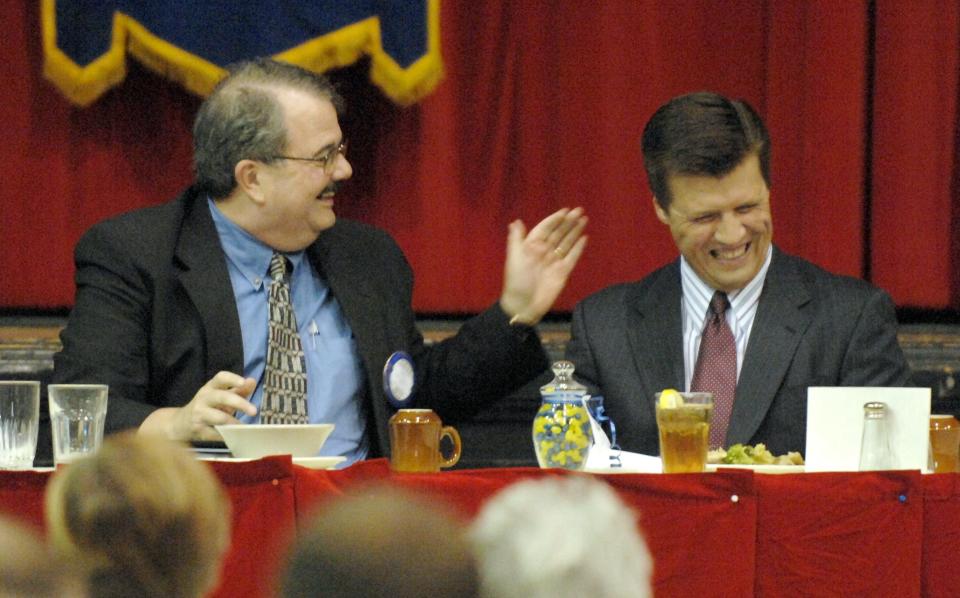 Steve Bohleber, left, jokes with John Hostettler, right, in a file photo.