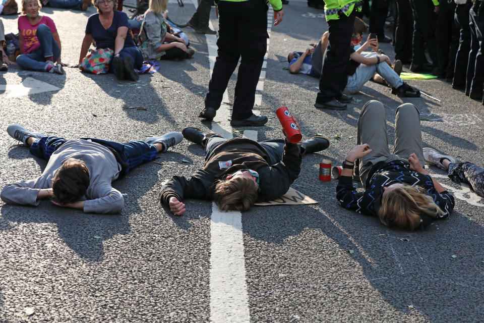 Extinction Rebellion demonstrators in Parliament Square, London. The environmental campaign group has planned for marches to be held at several landmarks in the capital, before moving to Parliament Square in Westminster. (Photo by Luciana Guerra/PA Images via Getty Images)