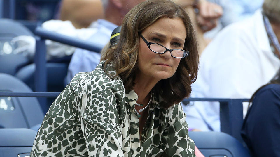 Seen here, tennis great Pam Shriver watches a tennis match from the stands.