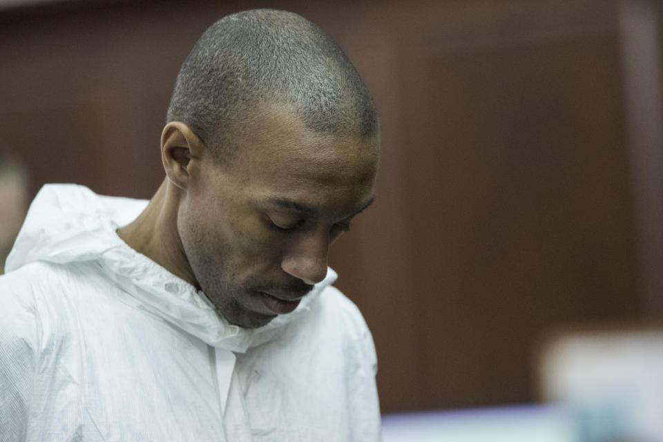 James Currie appears in Manhattan criminal court during his arraignment, Friday, Aug. 10, 2018, in New York. Currie is accused of throwing the lifeless body of his son, Mason Saldana, into the East River near the Brooklyn Bridge last Sunday. A tourist spotted the child's diaper-clad body and waded into the water to retrieve it. (AP Photo/Mary Altaffer)