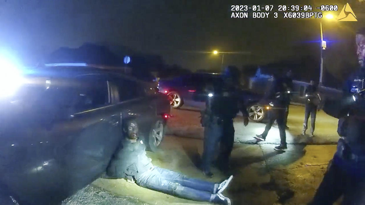 The image from video released on Jan. 27, 2023, by the City of Memphis, shows Tyre Nichols leaning against a car after a brutal attack by five Memphis police officers on Jan. 7, 2023, in Memphis, Tenn. Nichols died on Jan. 10. The five officers have since been fired and charged with second-degree murder and other offenses. (City of Memphis via AP)