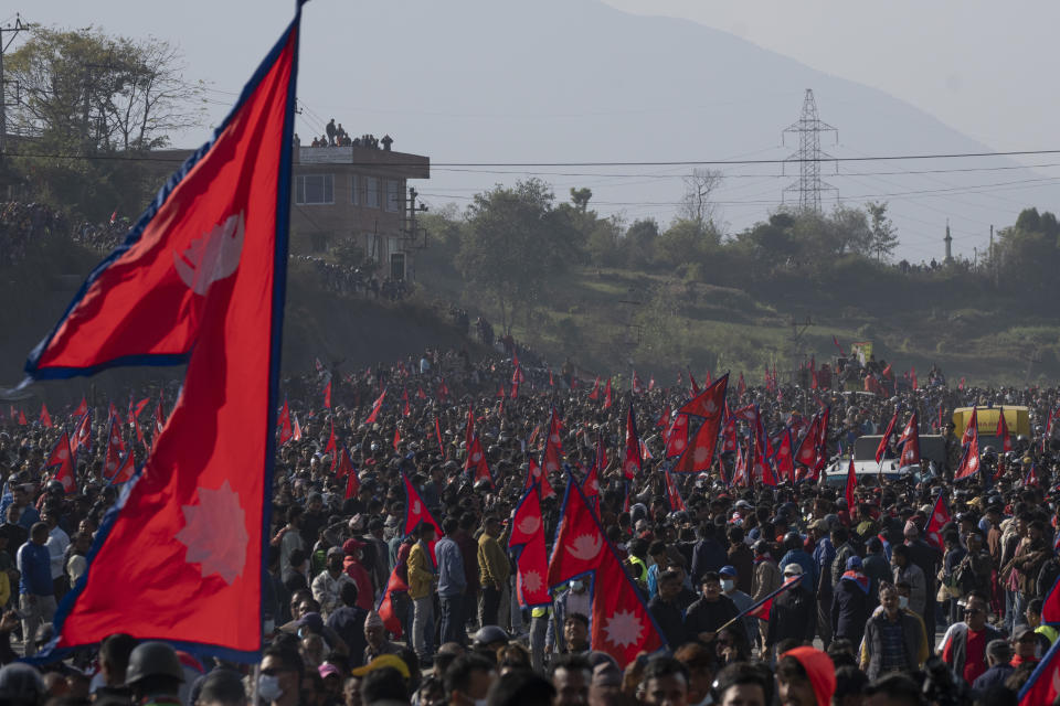 Protesters participate in a rally demanding a restoration of Nepal's monarchy in Kathmandu, Nepal, Thursday, Nov. 23, 2023. Riot police used batons and tear gas to halt tens of thousands of supporters of Nepal's former king demanding the restoration of the monarchy and the nation's former status as a Hindu state. Weeks of street protests in 2006 forced then King Gyanendra to abandon his authoritarian rule and introduce democracy. (AP Photo/Niranjan Shrestha)