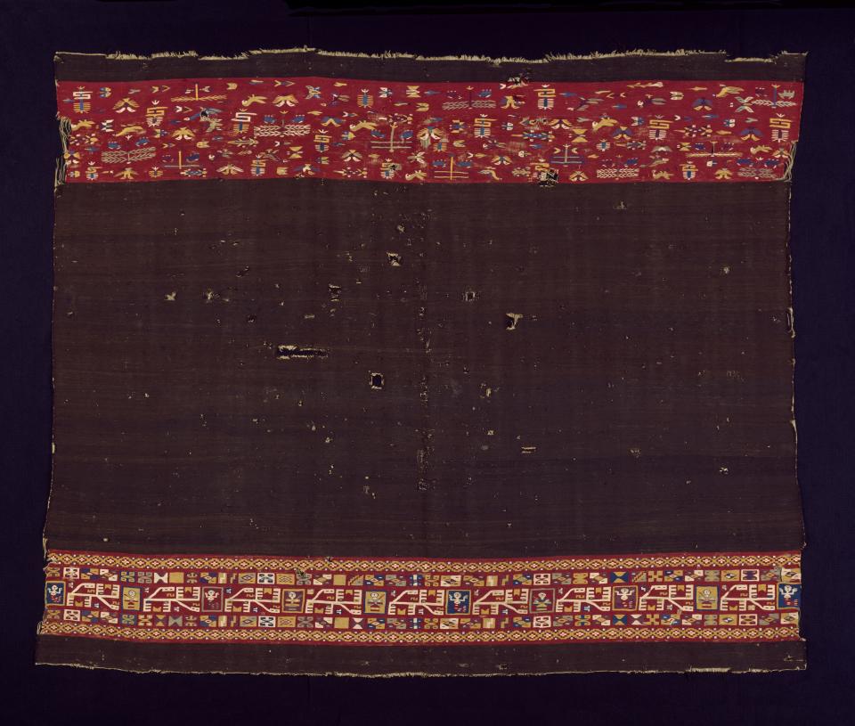 On Display at ‘Painted Cloth’: Inca anacu (woman’s dress), late 16th century, camelid fiber and cotton with embroidered-edge stitching, Brooklyn Museum, gift of Dr. John H. Finney. - Credit: Courtesy Blanton Museum of Art
