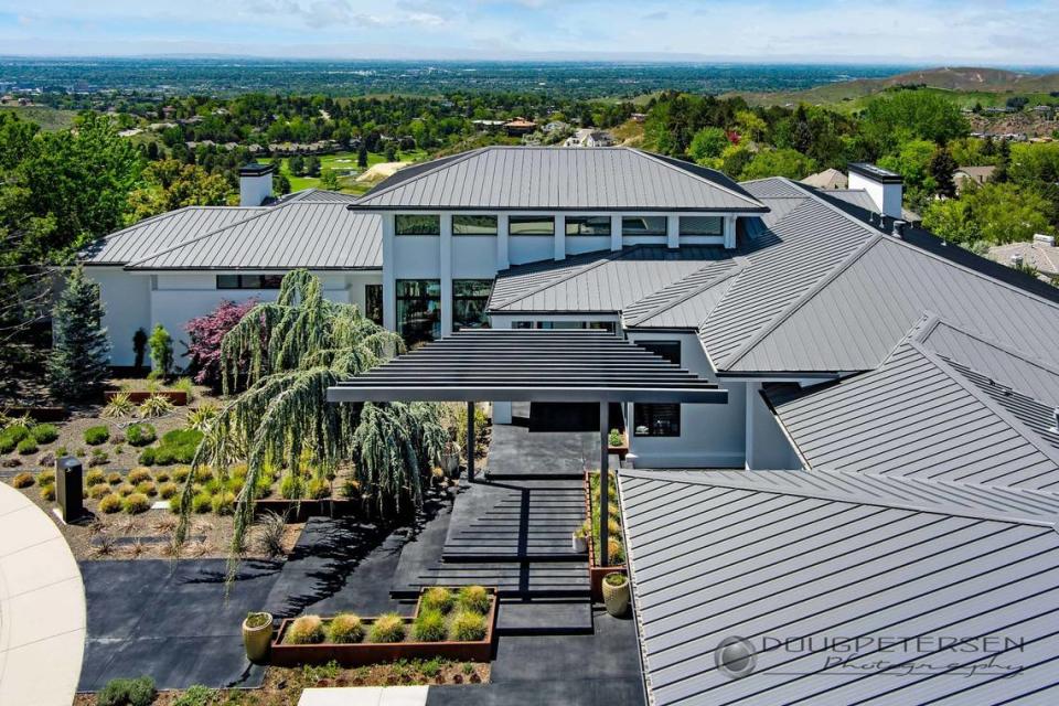 The most expensive home now for sale in Boise is listed for $4.98 million. It features expansive views of the North End and sparkling city lights at night. This image shows the home’s main entrance.