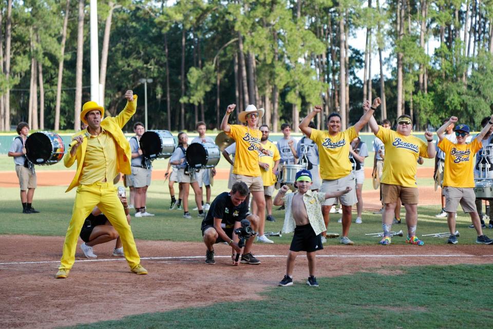 A young fan leads everyone in a dance before the start of a recent home game at Grayson Stadium.