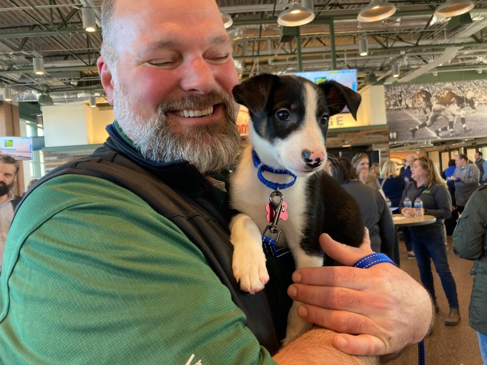 Happily Ever After brought the best parts of its no-kill animal sanctuary to Wednesday's Give BIG Green Bay launch at the Johnsonville Tailgate Village: puppies.