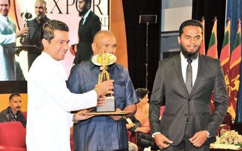 Sri Lankan suicide bomber Inshaf Ahamad, pictured far right alongside his successful businessman father Mohamed Ibrahim in 2016 - Credit: Daily News