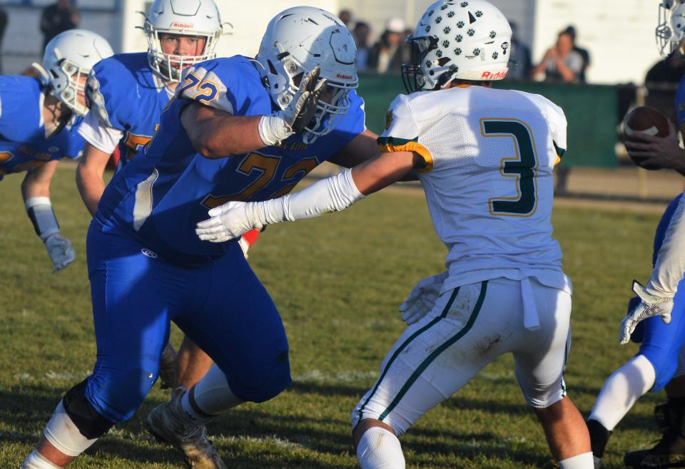 Fall River sophomore offensive lineman Remington Blue (left) makes a block against Le Grand senior Jeremiah Lopez (right) during the CIF Northern Regional Division 7-AA title game at Fall River High School on Saturday, Dec. 4, 2021.