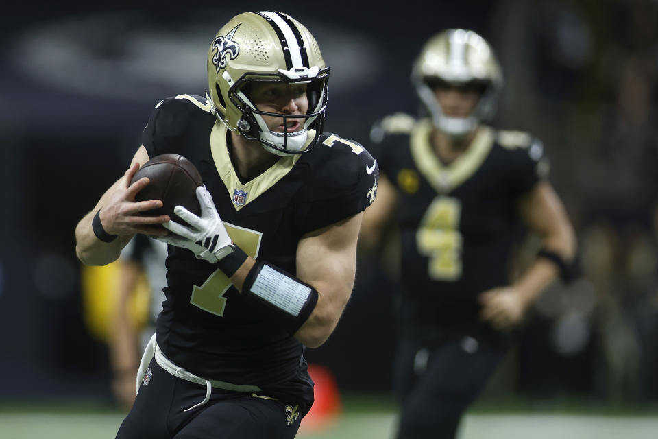NEW ORLEANS, LOUISIANA – JANUARY 07: Taysom Hill #7 of the New Orleans Saints runs the ball in the first half at Caesars Superdome on January 07, 2024 in New Orleans, Louisiana. (Photo by Chris Graythen/Getty Images)
