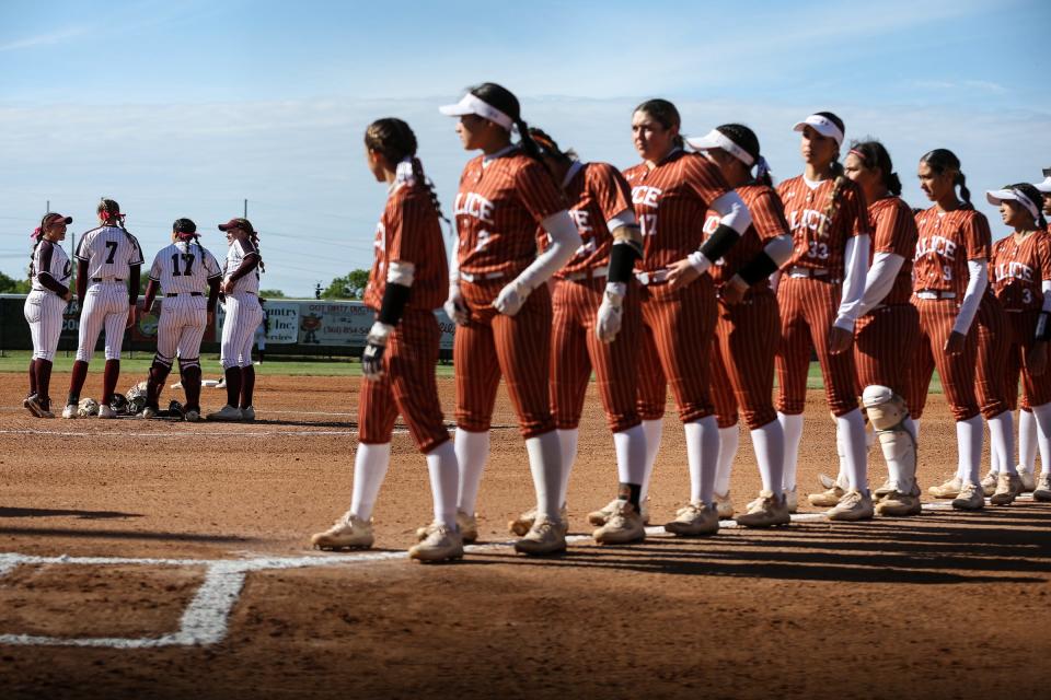 The starting lineups for Alice and Calallen are introduced before the softball game on March 17, 2023, at Calallen High School in Corpus Christi, Texas.