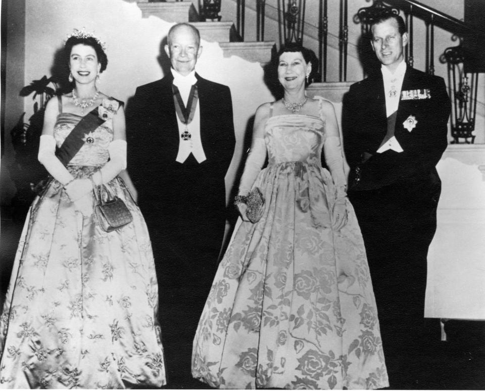 Left to right: Queen Elizabeth II, President Dwight Eisenhower, Mamie Eisenhower and Prince Phillip are shown at the White House State Dinner in 1957.