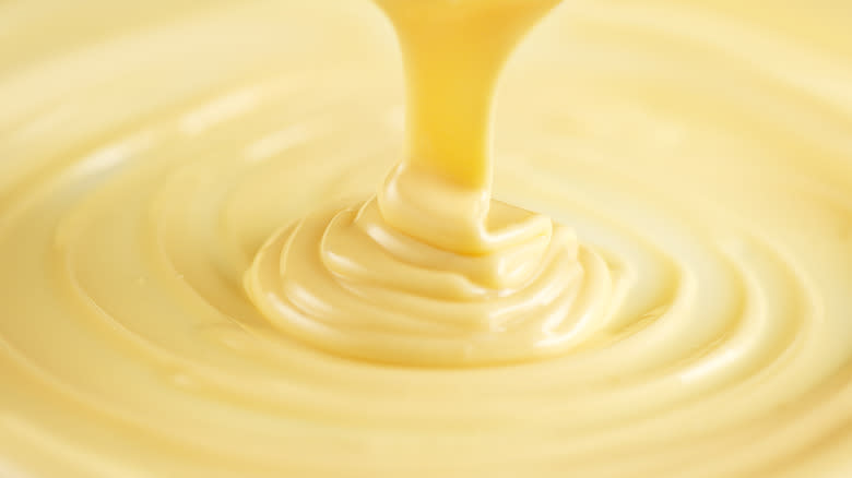 Pouring melted white chocolate