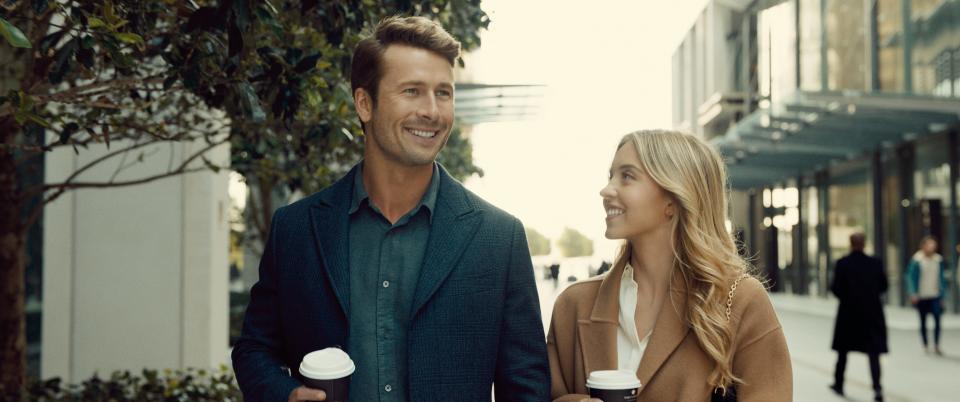 "We're bringing the big-budget, big-laughs romance back to theaters," says Glen Powell, left, pictured with co-star Sydney Sweeney.