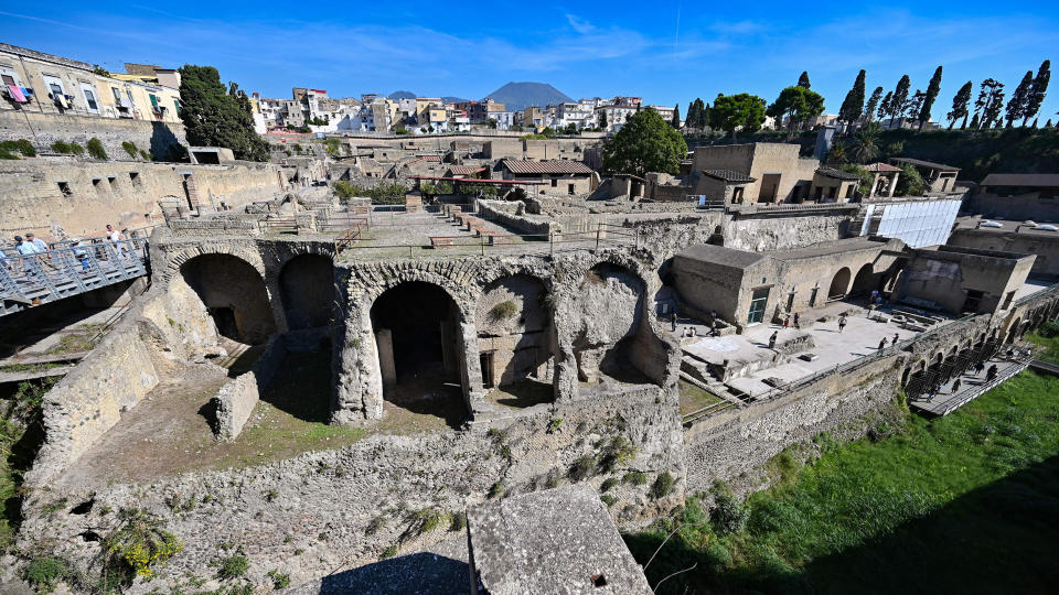 Image: The archaeological site of Herculaneum in Ercolano, near Naples, with the Mount Vesuvius volcano in the background, Italy. (Andreas Solaro / AFP via Getty Images file)