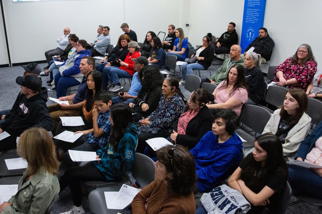 People attend a Salem-Keizer School District budget committee meeting Tuesday night in Salem.