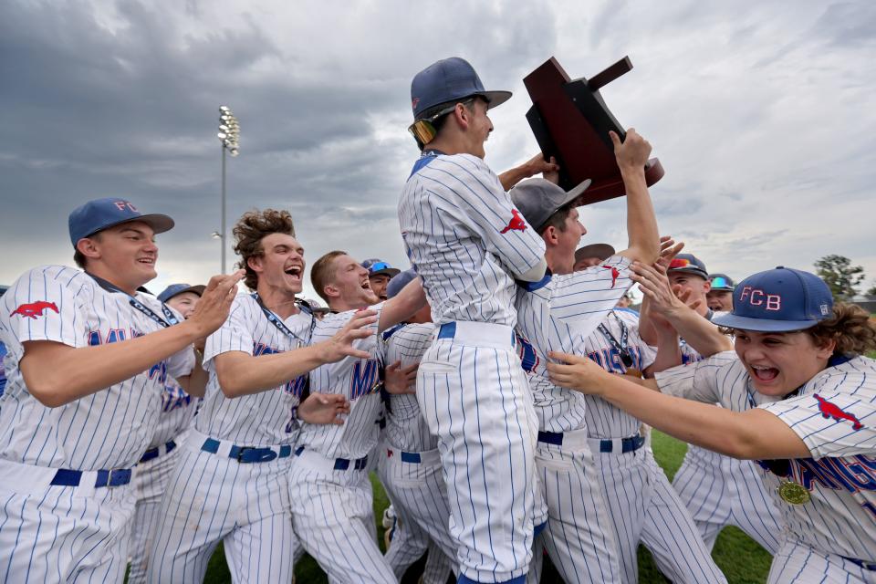 Fort Cobb-Broxton celebrates after beating Calumet for the Class B state baseball championship Saturday in Shawnee.