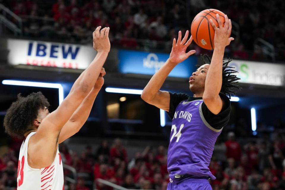 Ben Davis Giants K.J. Windham (24) lays the ball up against the Fishers Tigers on Saturday, March 30, 2024, during the IHSAA boys basketball Class 4A state championship game at Gainbridge Fieldhouse in Indianapolis. The Fishers Tigers defeated the Ben Davis Giants 65-56.