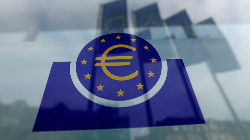 Specialists work on a crane in front of the European Central Bank (ECB) in Frankfurt