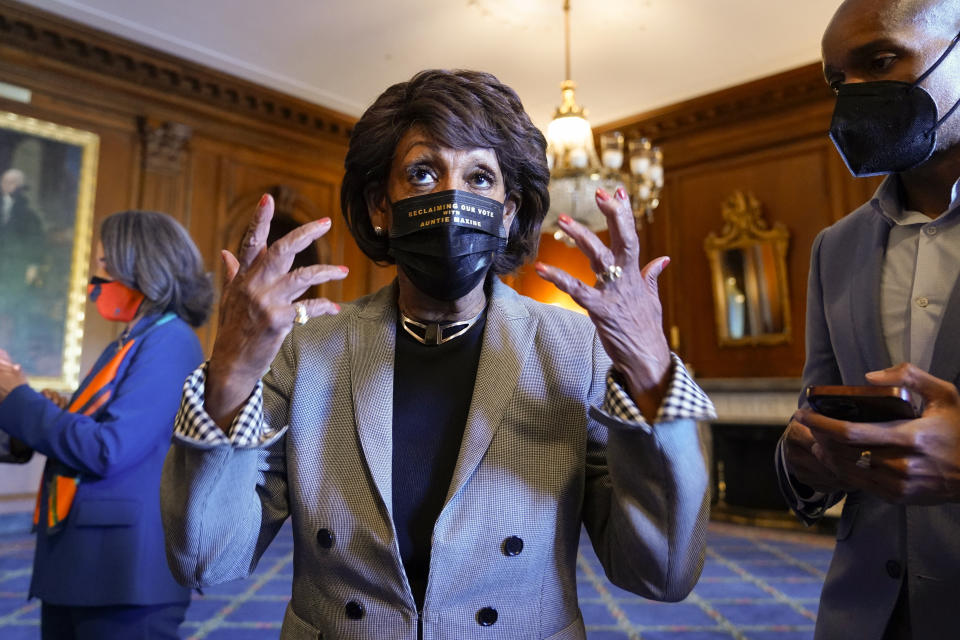 Rep. Maxine Waters, D-Calif., talks on Capitol Hill in Washington on Tuesday, April 20, 2021, as she waits for the verdict to be read in the murder trial of former Minneapolis police Officer Derek Chauvin in the death of George Floyd. (AP Photo/J. Scott Applewhite)