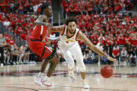 Iowa State's George Conditt IV (4) works around Texas Tech's Davion Warren (2) during the first half of an NCAA college basketball game against Texas Tech on Tuesday, Jan. 18, 2022, in Lubbock, Texas. (AP Photo/Chase Seabolt)