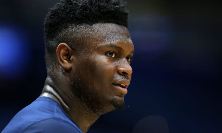 Former Duke star Zion Williamson warms up during an NBA game.