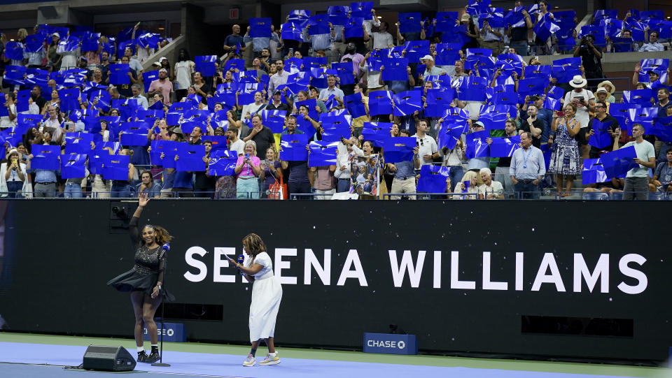 Serena Williams, of the United States, waves to the crowd during a tribute to her career after she defeated Danka Kovinic, of Montenegro, during the first round of the US Open tennis championships, Monday, Aug. 29, 2022, in New York. (AP Photo/Charles Krupa)