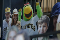 An image of the Pittsburgh Pirates Parrot mascot is mixed in with other cutout spectators in the stands behind home plate at PNC Park before a baseball game between the Pittsburgh Pirates and the Minnesota Twins, Wednesday, Aug. 5, 2020, in Pittsburgh. (AP Photo/Keith Srakocic)