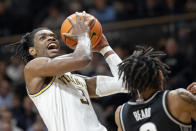 Villanova forward Brandon Slater (3) goes to the basket past Georgetown guard Tyler Beard (3) during the first half of an NCAA college basketball game, Saturday, Feb. 19, 2022, in Villanova, Pa. (AP Photo/Laurence Kesterson)