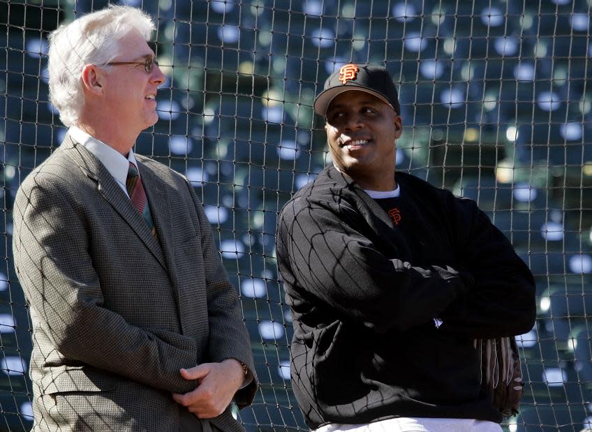 Giants broadcaster Mike Krukow (left) stands with Barry Bonds before a game in 2006. (AP)