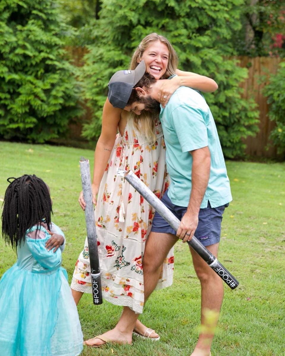 As the couple revealed the sex of their baby on the way, Lauren seemed to have an inkling, wearing a dress with pink and red flowers for the event.