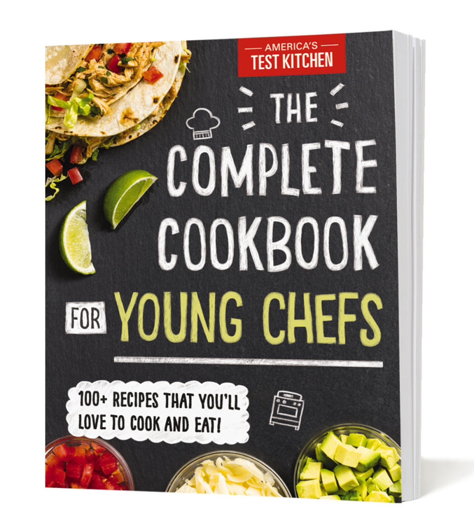 This image provided by America's Test Kitchen in February 2019 shows the cover for “The Complete Cookbook for Young Chefs.” It includes a recipe for Roasted Broccoli. (America's Test Kitchen via AP)