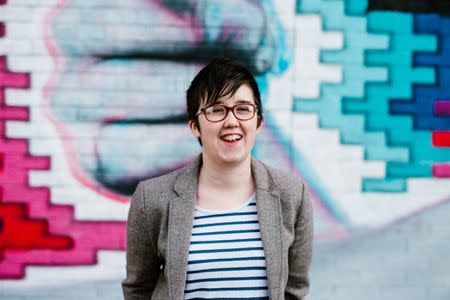 Journalist Lyra McKee smiles outside the Sunflower Pub on Union Street during a portrait session in Belfast, Northern Ireland May 19, 2017. Jess Lowe Photography/Handout via REUTERS